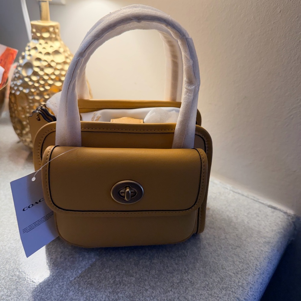 The Coach Originals Glovetanned Leather Mini Safari Tote - mustard/yellow - Picture 1 of 14